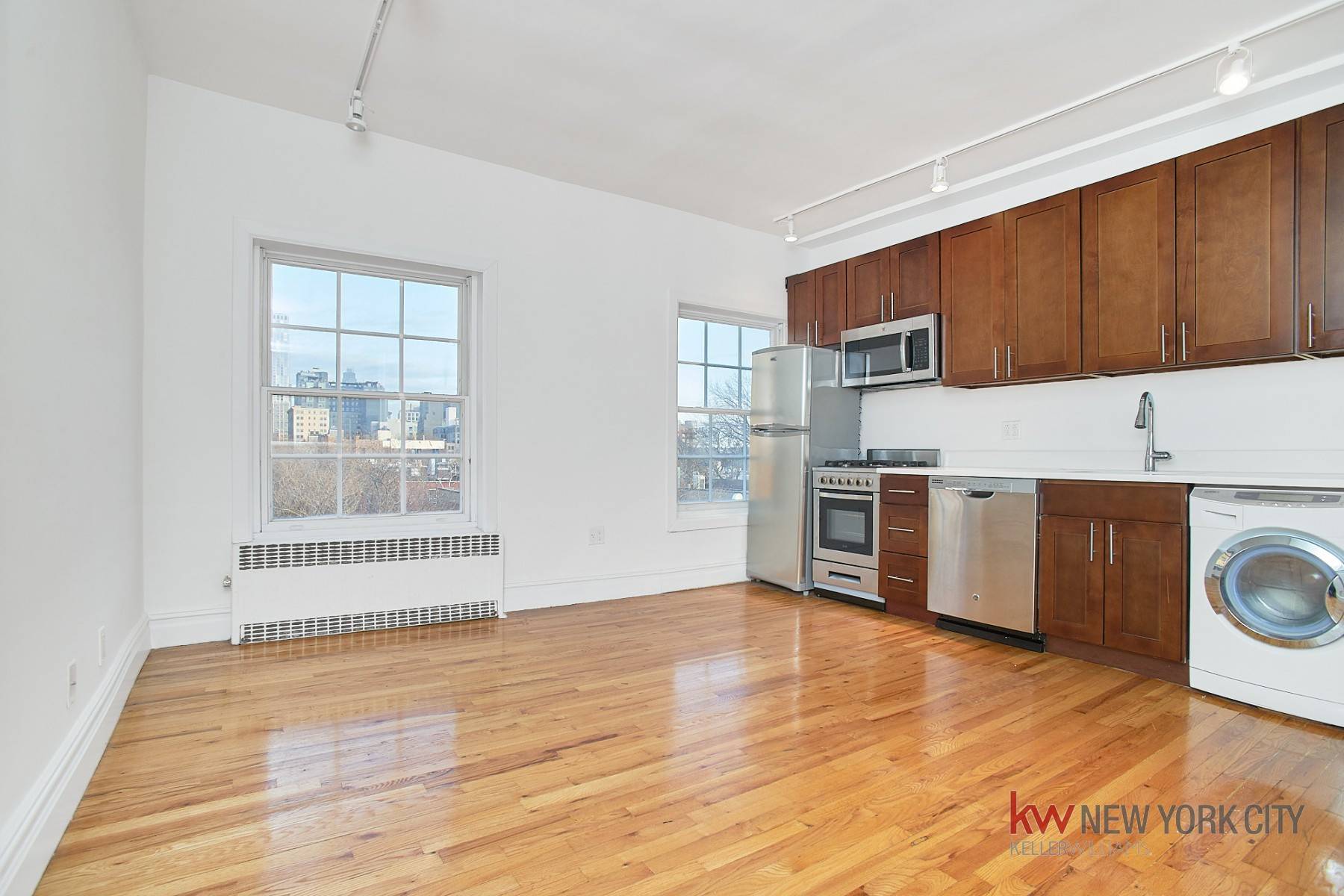LOWEST PRICED one bedroom available for rent in Brooklyn Heights that has laundry in unit, dishwasher, and a private patio !