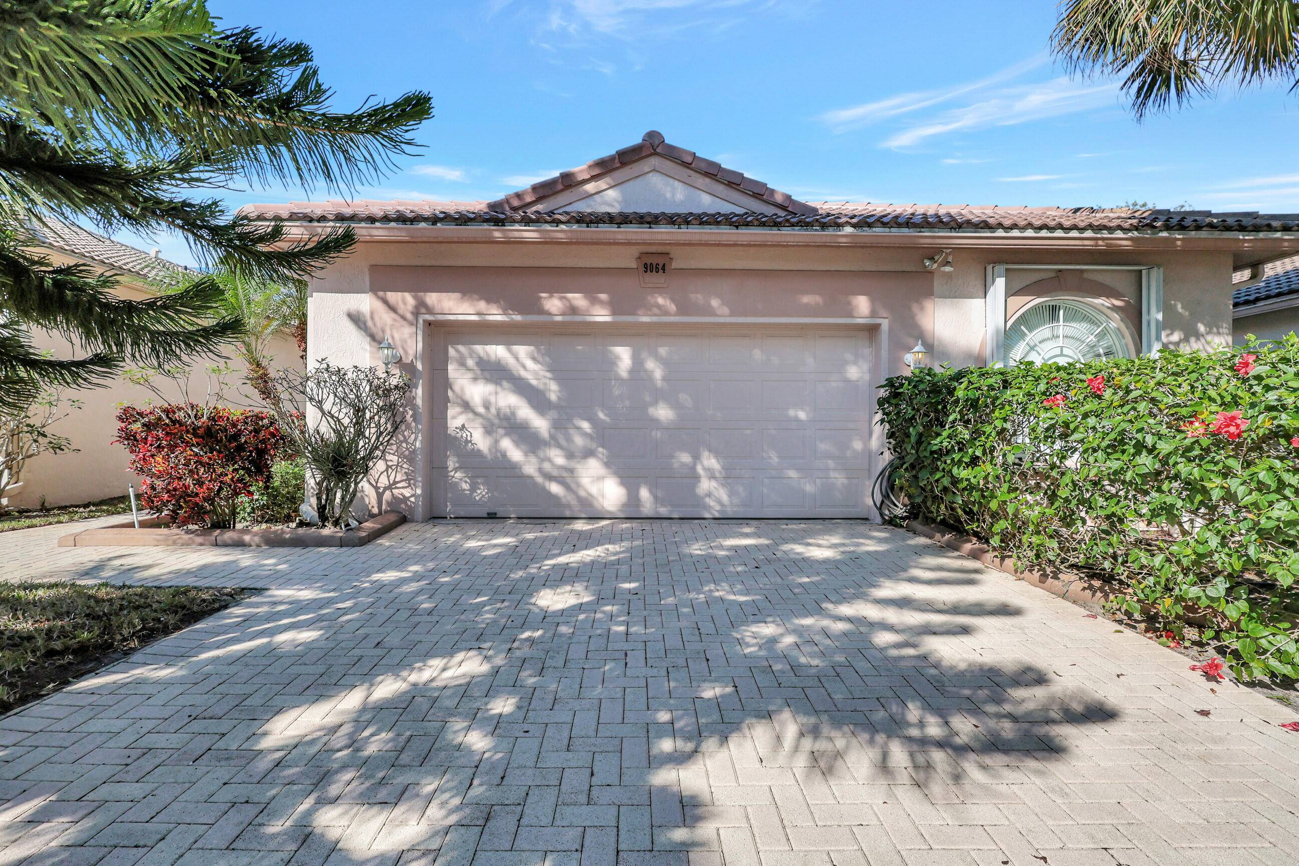 Must see in your search for a new home, located in West Palm Beach's premier 55 resort style community, gated and boasting the areas largest clubhouse and recreational facilities.