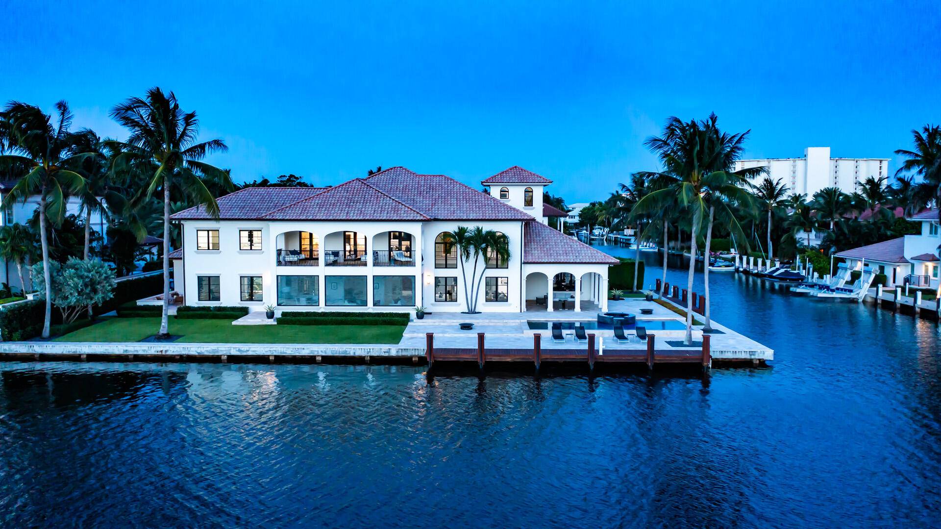 Magnificent Delray Beach estate, an architectural masterpiece recently completely reimagined and renovated with every amenity, is sited on an incredible point lot with 266 feet of waterfront and dockage on ...