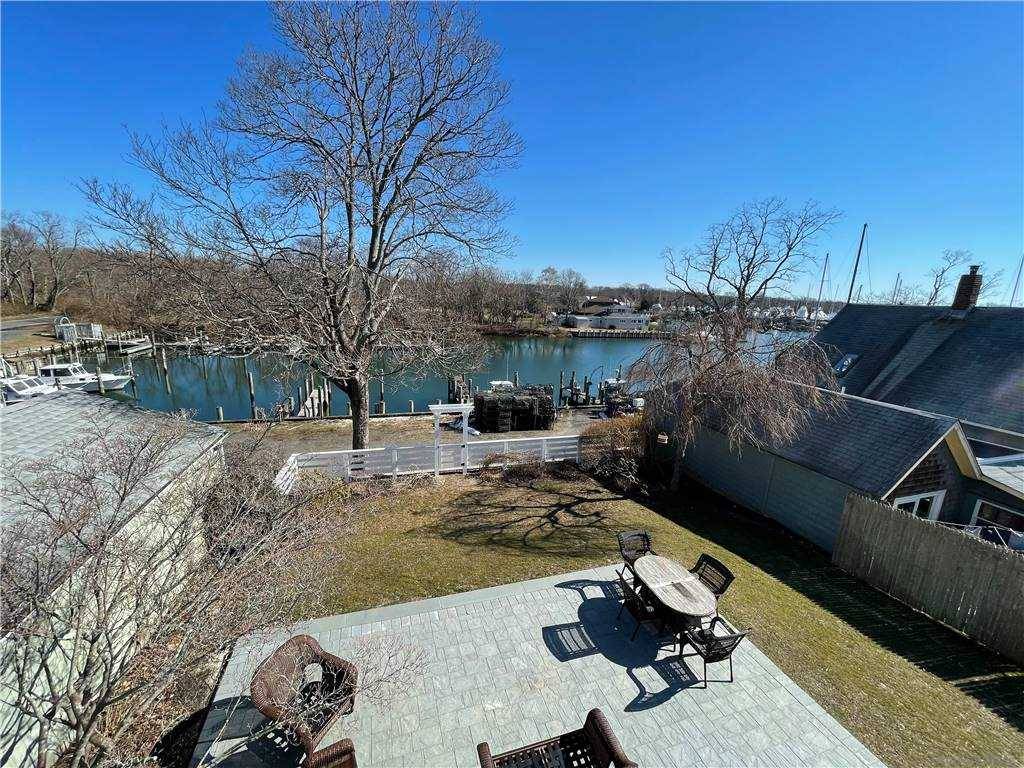 Meticulously Renovated and Curated 3 Bedroom Home Overlooking The Harbor.