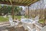 View of patio featuring an outdoor fire pit