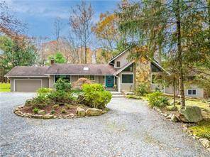 Captivating Contemporary Ranch style home located near both Wilton and New Canaan centers, expanded and renovated with two Primary Suites on the main floor for easy living !