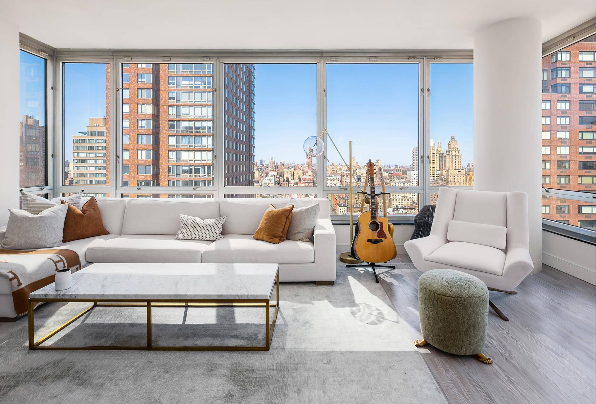 Indulge in the epitome of luxury living with this meticulously renovated corner apartment boasting direct Central Park and skyline views.