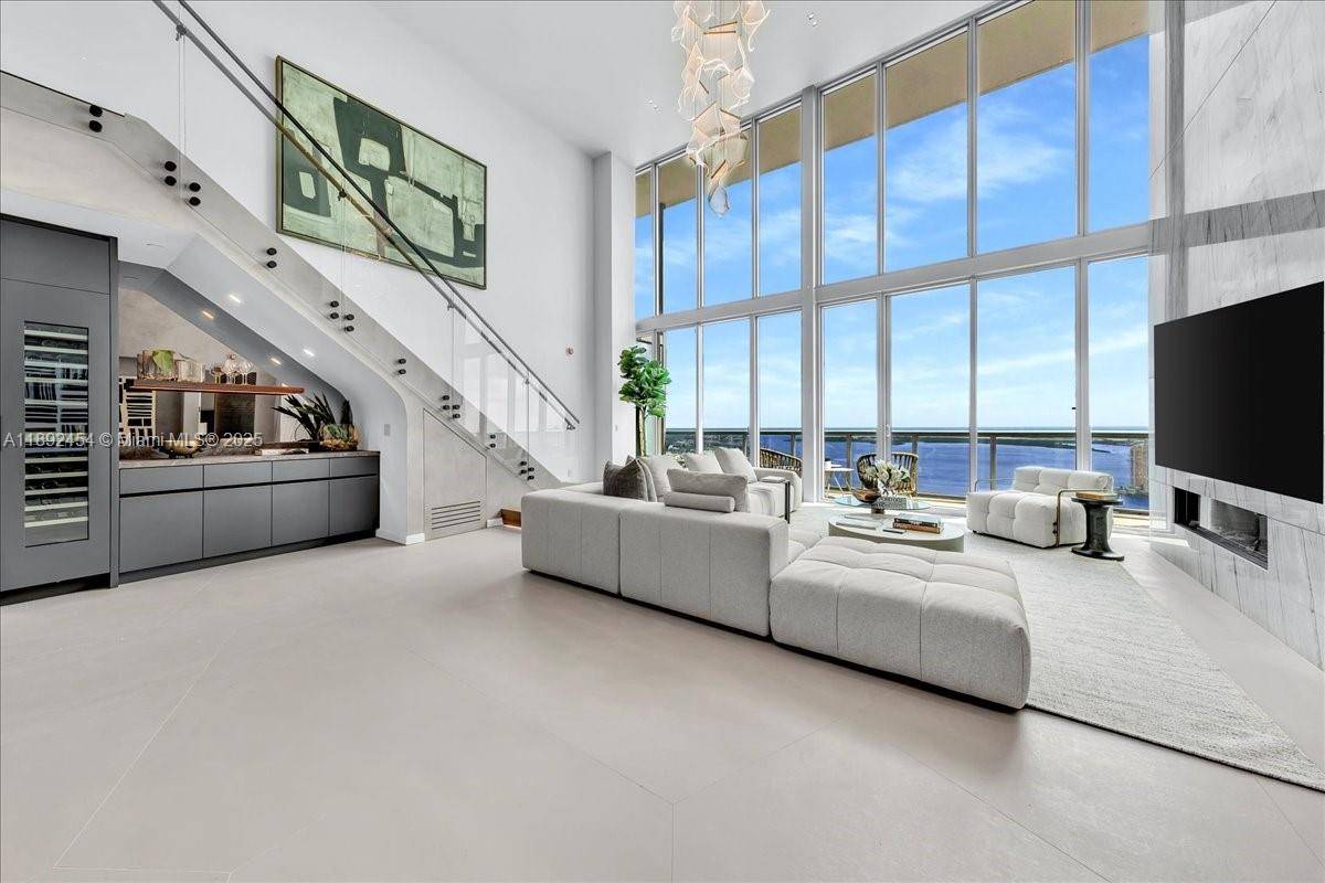 A TRUE MASTERPIECE ! Fully Renovated No Expense Spared 2 Story Upper Level Penthouse !