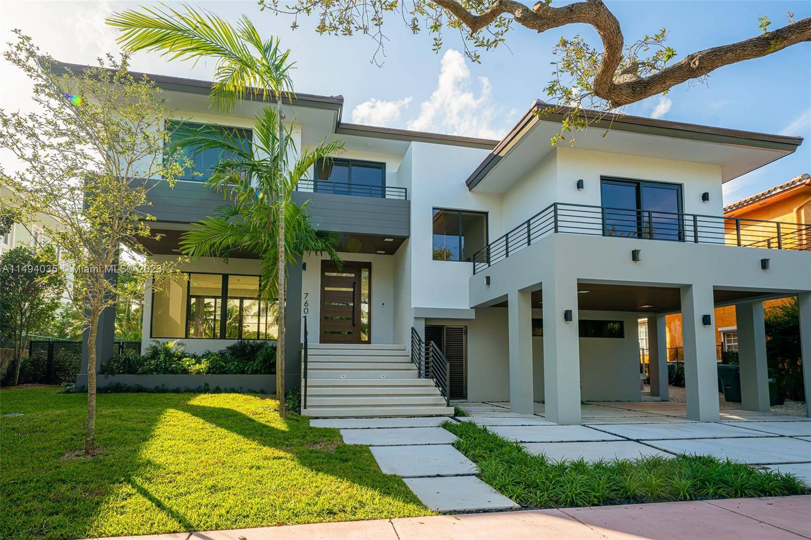 Indulge in luxury at this READY TO MOVE Key Biscayne home on Woodcrest Rd.