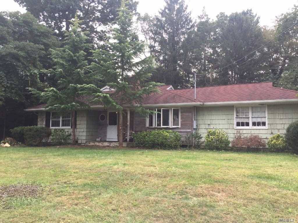 Village of the Branch location Expanded ranch with master bath wlk in closet all good size bedrooms house needs updating thru out tremendous possibilities to be beautiful !
