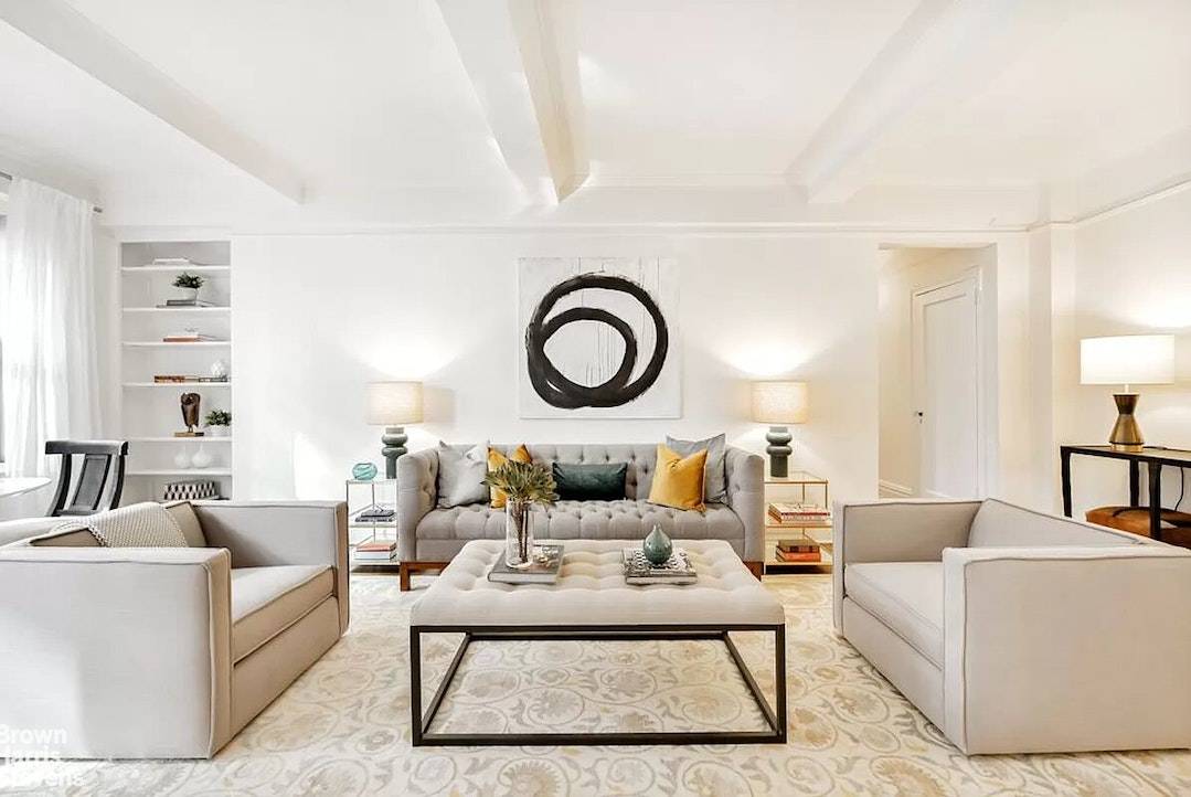 With Art Deco inspired moldings, arched doorways, and beautifully proportioned rooms, this gracious two bedroom, two bathroom home has an extremely flexible layout.