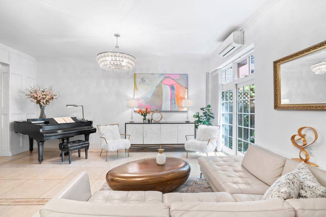 534 East 84th Street, 1E is a spacious and sensationally sunny townhouse like duplex with an oversized garden patio encompassing the first and second floors of The Chapin, a pre ...