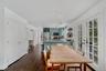Dining space featuring french doors and dark wood-style floors