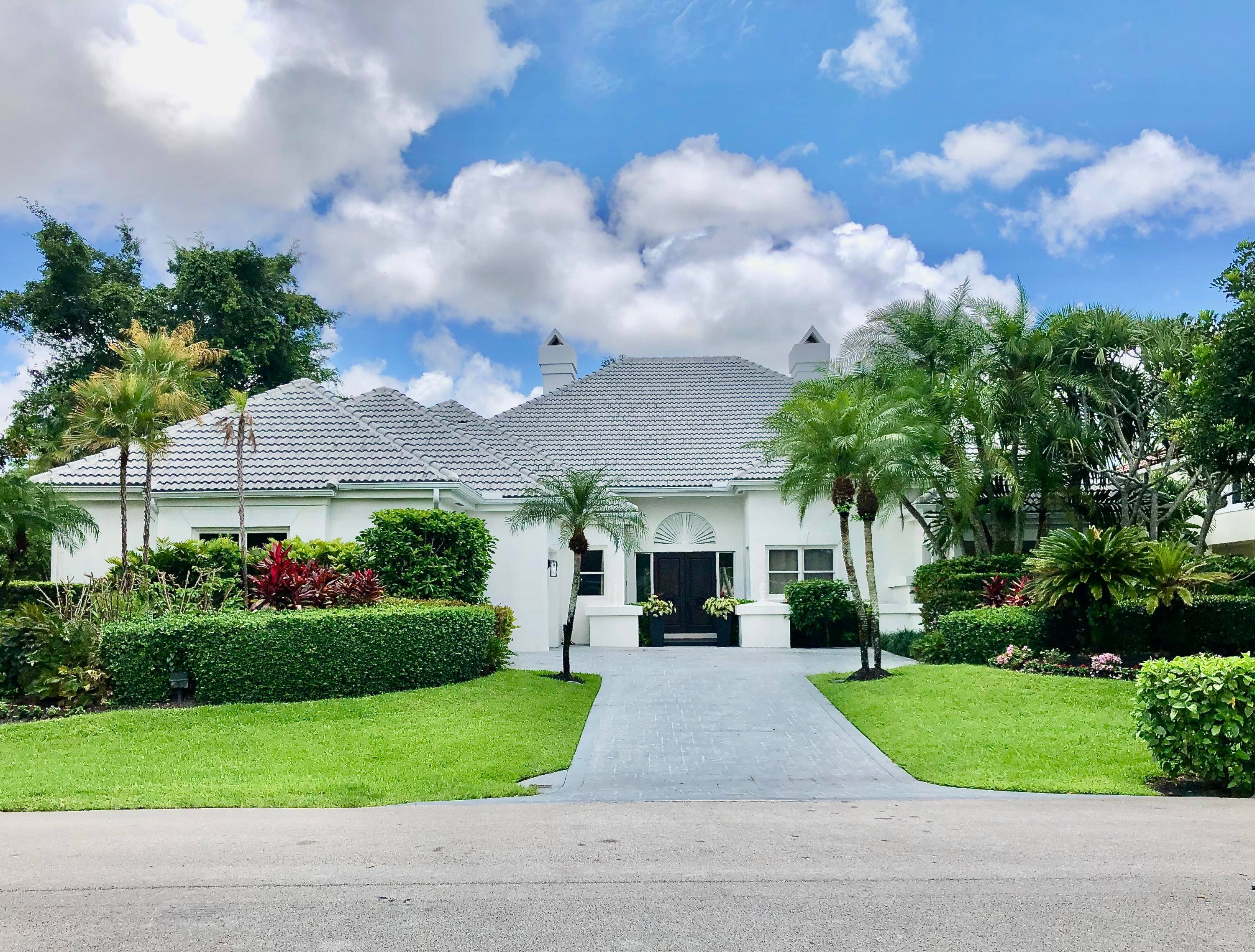 Ideal for equestrian enthusiasts, this meticulously renovated residence is located in the sought after Golf Brook enclave within Palm Beach Polo and Country Club.