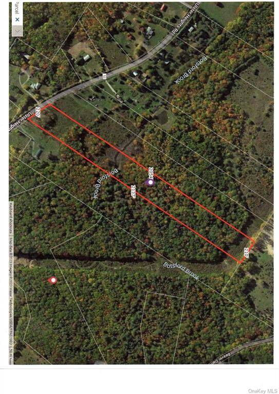 220 frontage b y 2054 long stream flows through the middle of the property, partially cleared by the road, woods in the rear, build on it or hunt.