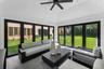 Sunroom with lofted ceiling