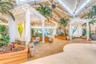 Beautiful resort interior with lush landscaping in Margaritaville Resort Orlando