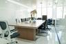 Office space featuring marble finish floor and visible vents
