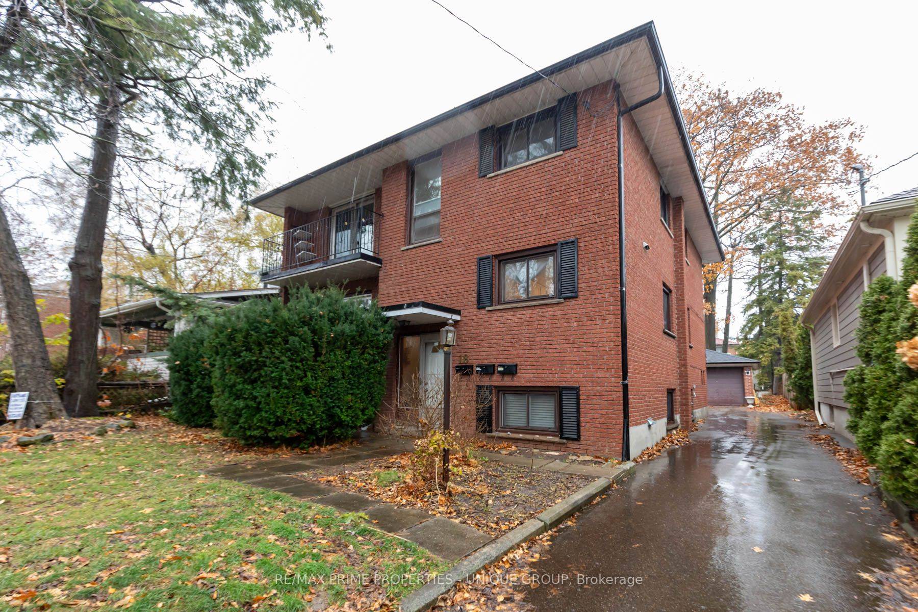 3 Suite Long Branch Investment Property Duplex with additional Basement Apartment Huge Suites Approx 1, 200 Square Feet in Main and Upper Apartments Detached Brick Building with Front Balconies Private ...