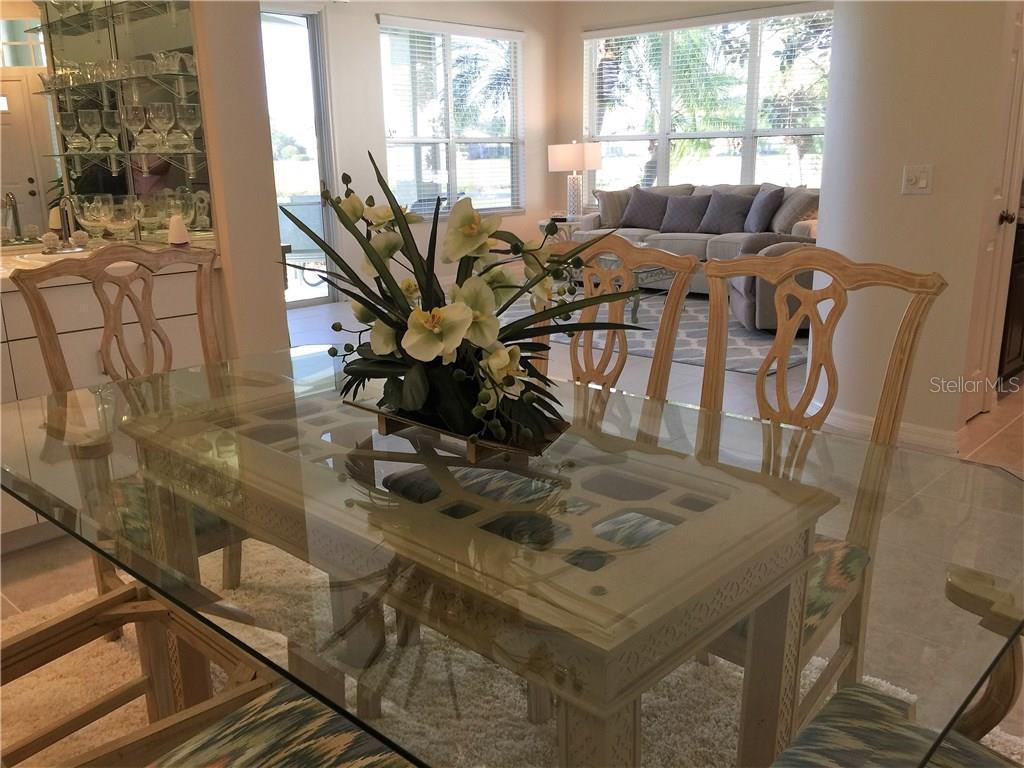 This dining room table is set up so beautifully you will want to invite all of the new friends you have made at VGCC over for dinner and drinks......w