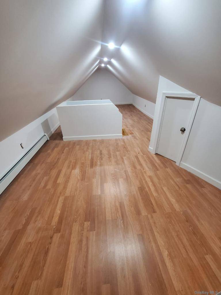Bright and spacious upper level apartment, large living room.