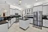 Modern Kitchen with large island and ample counter space