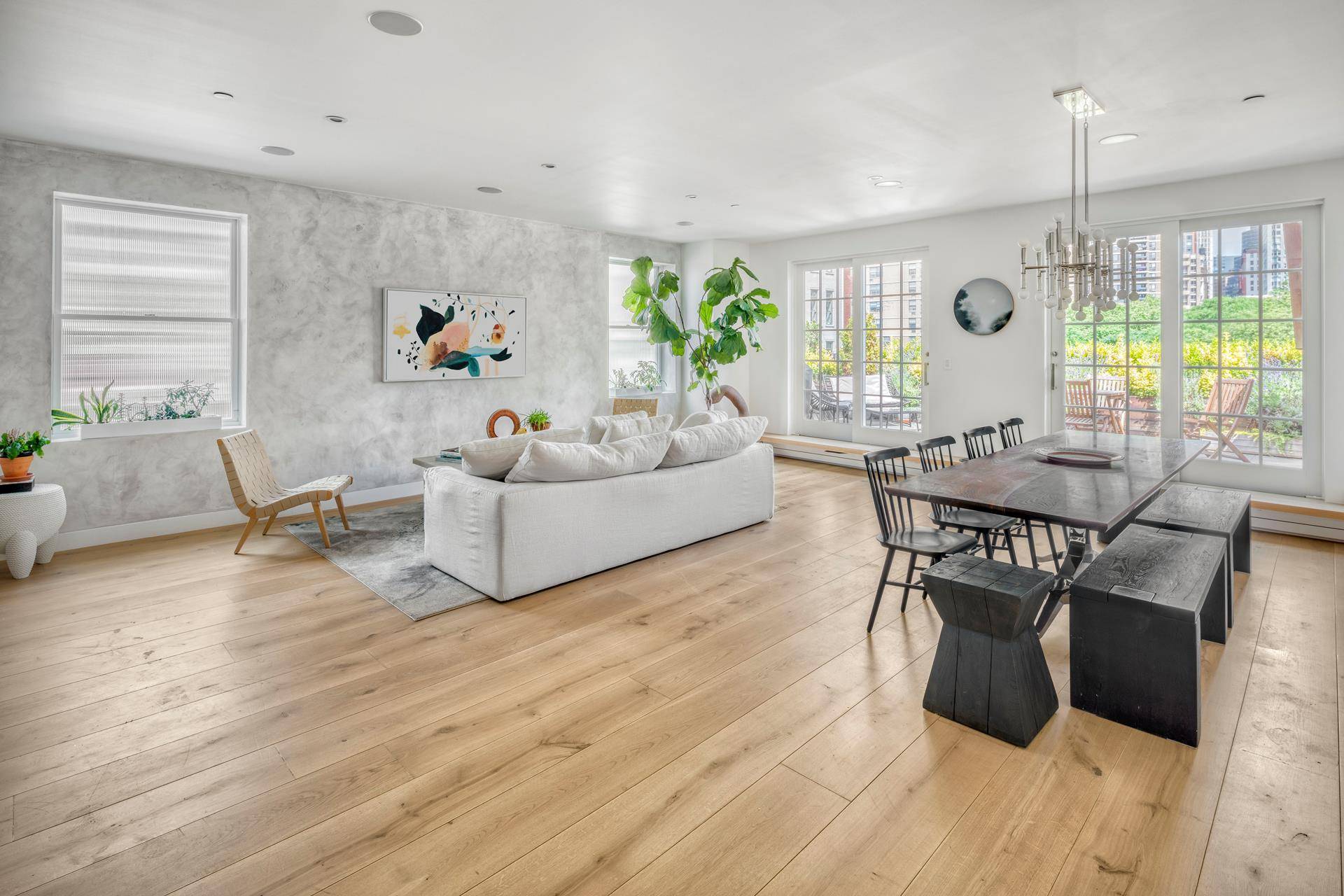 Truly one of a kind, this sun drenched, sprawling duplex condo with dual outdoor spaces is 130 Beekman Street's crown jewel, a gem within the revitalized South Street Seaport.