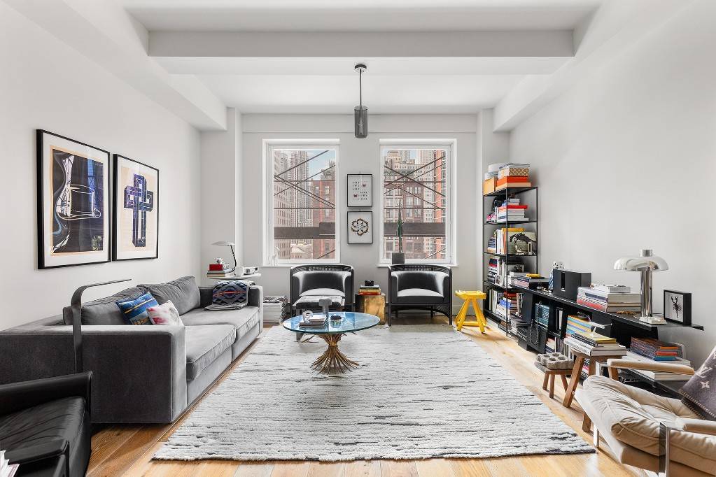 Beautifully finished with classic Tribeca pre war proportions this loft style 1 bedroom features bright southern exposures, high ceilings, gorgeous 7 inch white oak plank floors, and custom oversized 7 ...