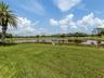 This home offers beautiful water and golf course views