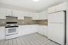 Another view of the kitchen showing ample counter space.To the far left of the oven, is pantry