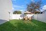 View of fenced backyard