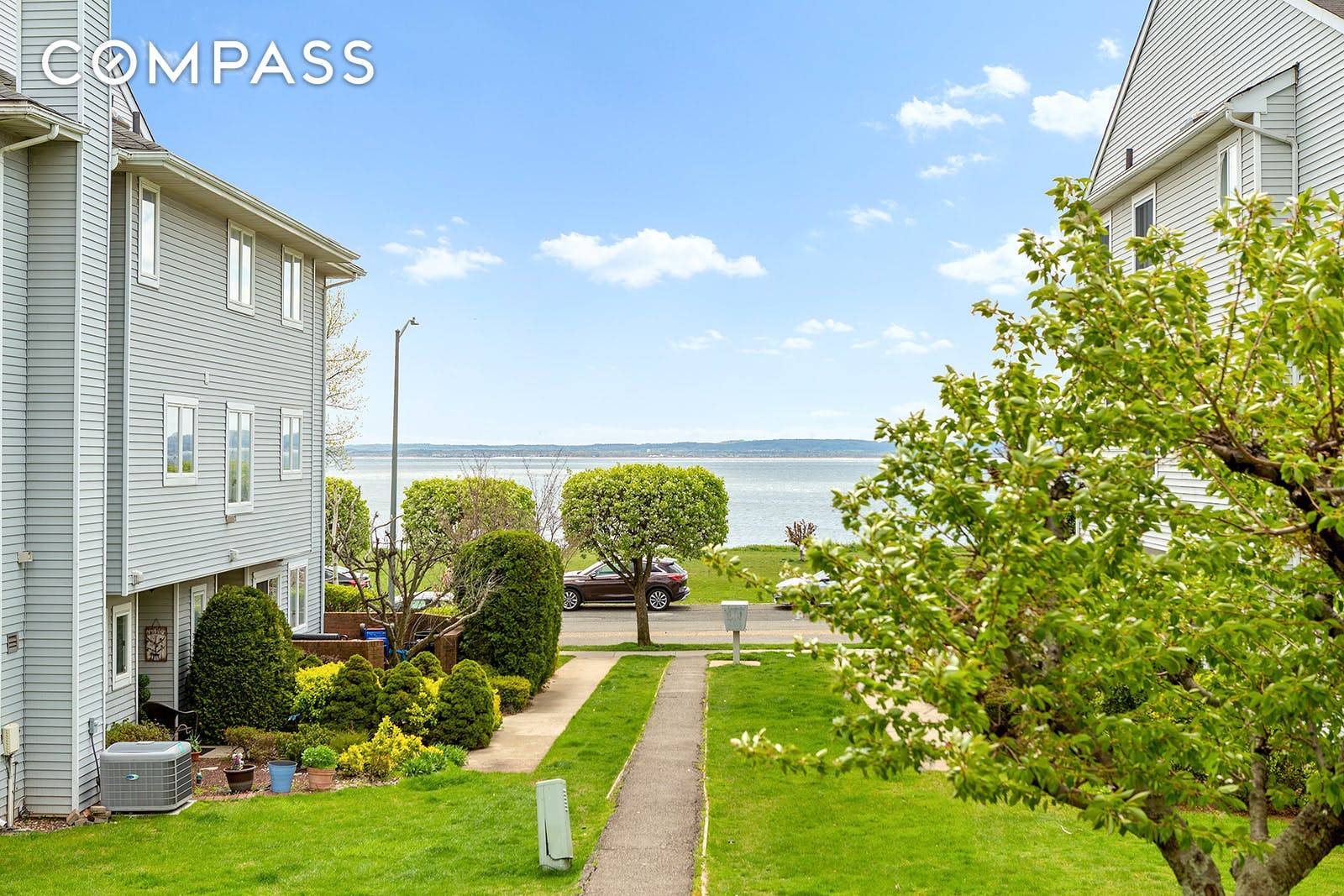 Newly renovated four level corner unit Townhome located in prestigious Captain s Quarters on Staten Island s South Shore with lovely partial ocean and resort style pool views on all ...