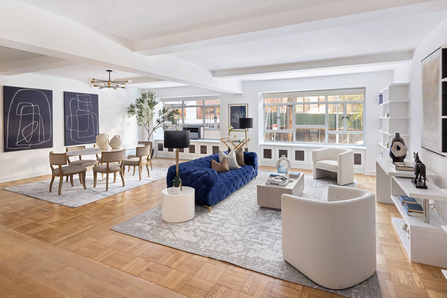 Just half a block from Central Park, this expansive three bedroom, three bath, 7.