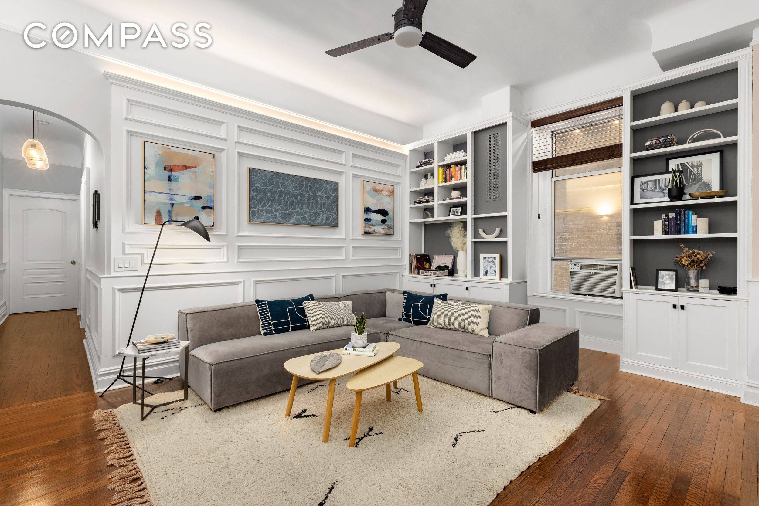 The first things you will notice when entering this 2 bedroom, 2 full bathroom home is the exquisite wainscoting and the ceiling height of nearly 11 feet.