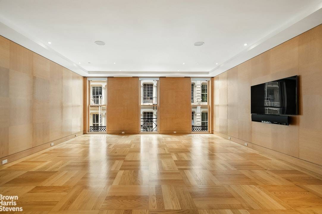 This expansive two bedroom, two bathroom sanctuary is over 2200 square feet with the best of both worlds a custom modern renovation in an historic, landmarked building.