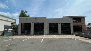 4 Bay garage in a prime location, close to highway and major retailers, great for a tire shop, mechanic's shop