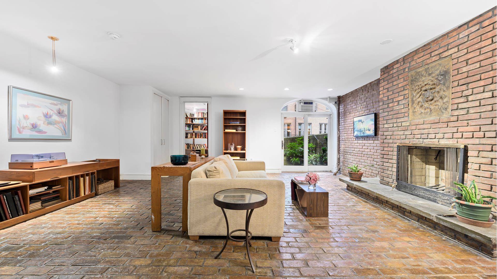 This generously sized, garden level duplex apartment is located in a boutique coop building on one of the Upper West Side's most picturesque blocks.