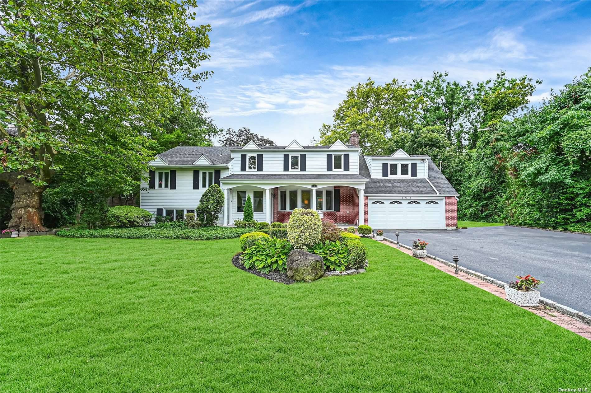 Welcome to this beautiful 5 bedroom, 4 full bath, 2 half bath home in Manhasset !