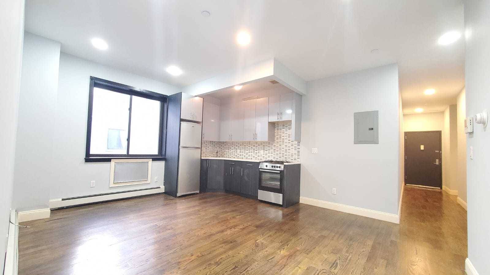 Incredible 3 Bedroom HUGE Apartment with Garage Parking and Laundry.