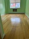 Empty room with baseboards and a baseboard radiator