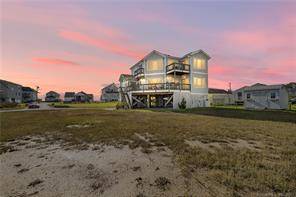 Located in the Chalker Beach Association is this stunning custom 2006 year built 3 bedroom, 3 bathroom home with incredible water views surrounding the home.