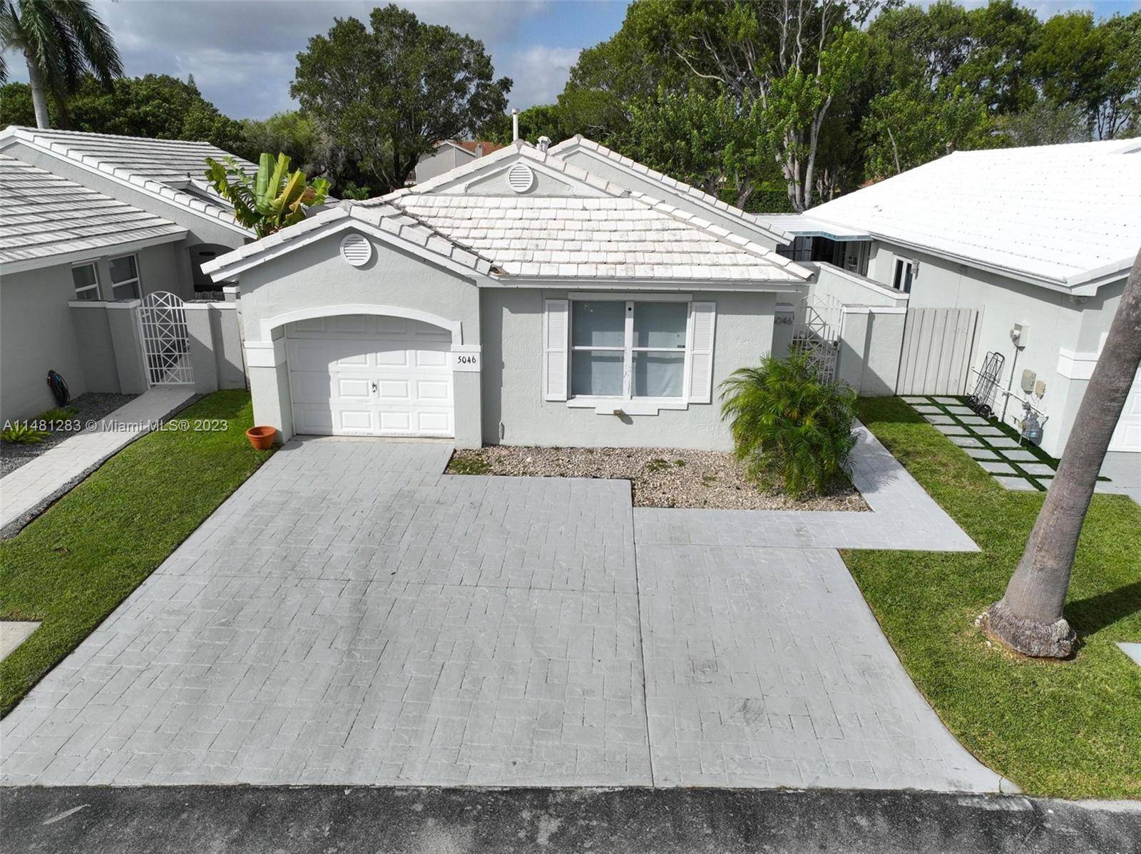Welcome to this 3 bedroom, 2 bathroom home that is nestled in an family oriented community in West Kendall.