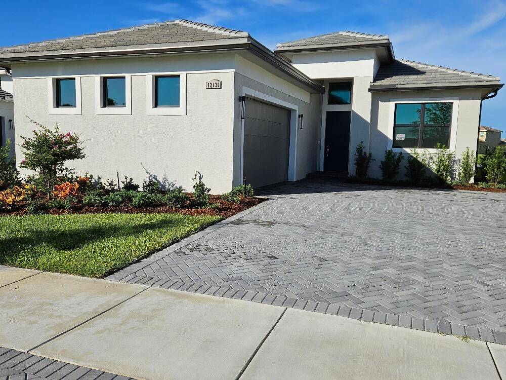 Brand new, never lived in LILA model with extended Master Bedroom and Lanai and 16 feet sliding glass door on a premium wide lake lot, ceramic flooring throughout, open kitchen, ...