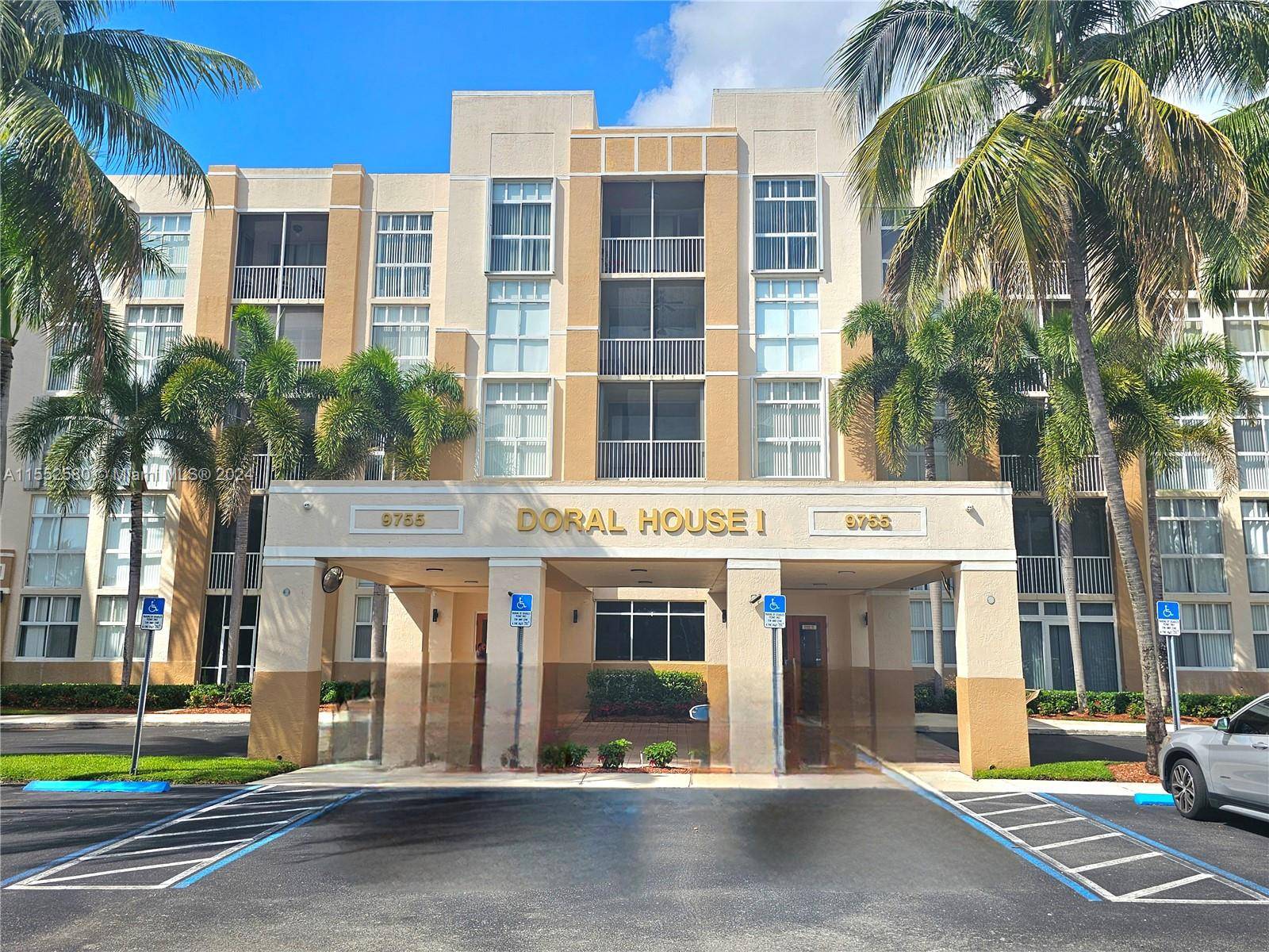 Beautiful 2 2 apartment in Doral with kitchen Marble top and wood like tile floors, most appliances like new, Washer and Dryer inside the unit.