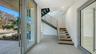 Floating steel staircase with handmade white oak treads