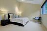 . Bright and inviting, this secondary bedroom provides comfortable accommodations for children or guests. These two bedrooms share a large hall bath w