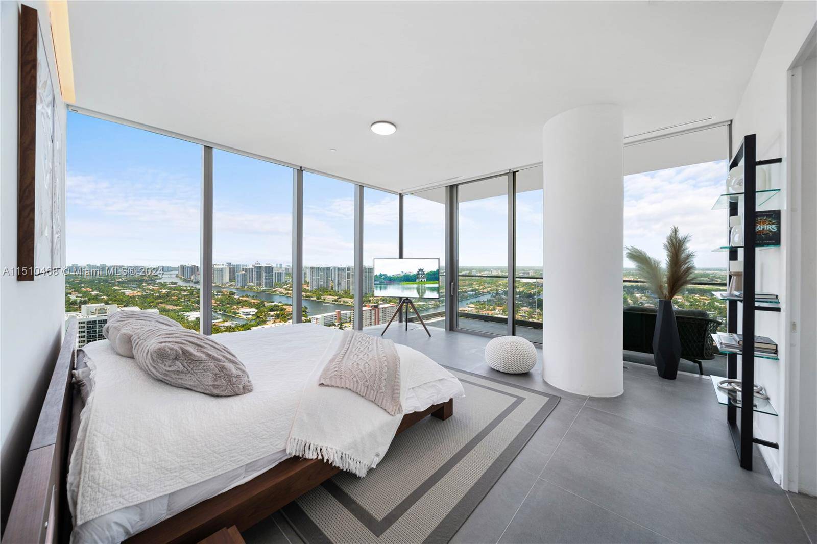 Breathtaking fully furnished half floor residence with east to west views from sunrise to sunset.