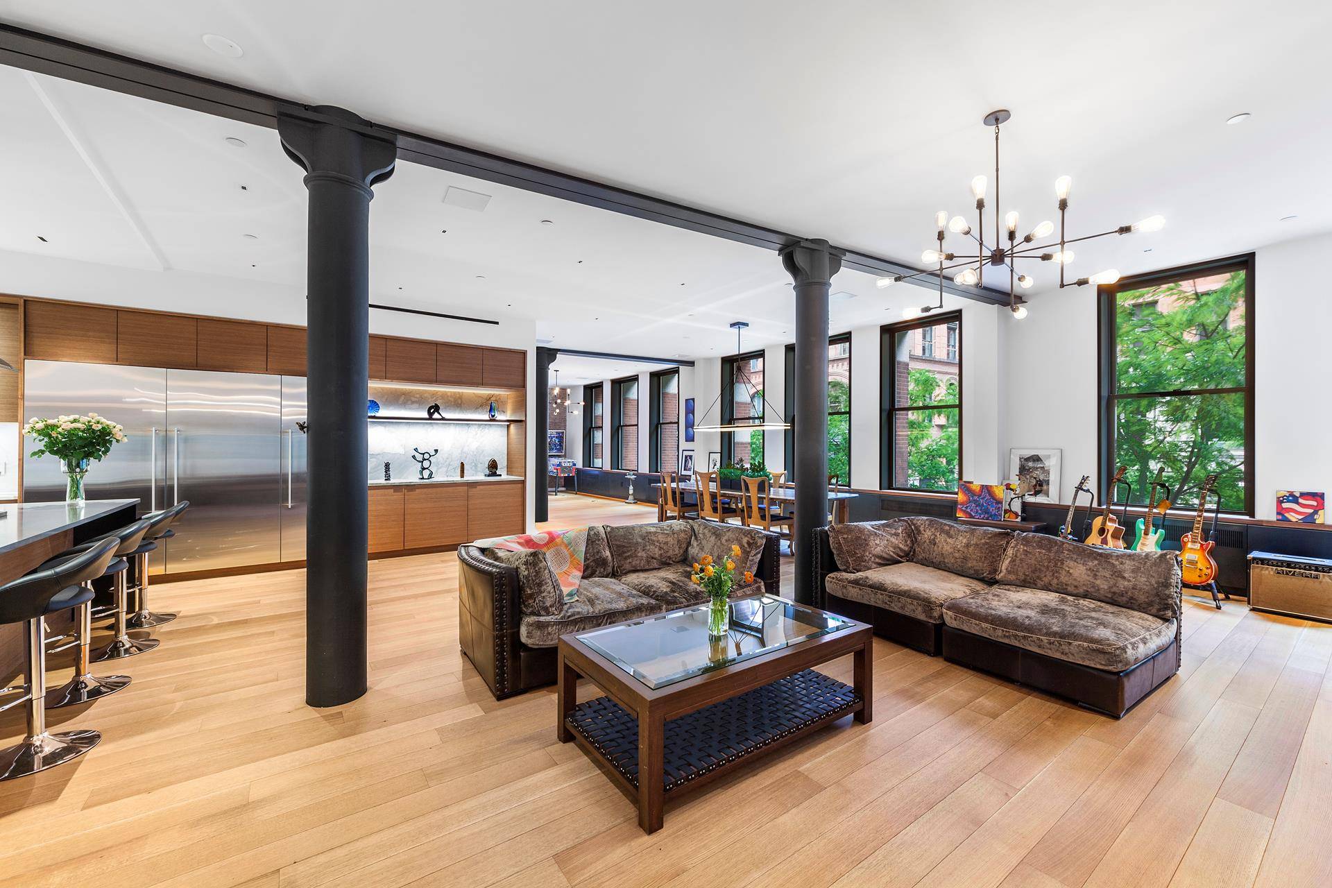 This extraordinary 3000SF SoHo loft, on a tree lined block, has just been intelligently designed and meticulously renovated.
