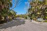 Entry to gated Land's End. Enjoy the privacy but also the friendliness of being part of the adjacent historic Longbeach Village, with its painter and
