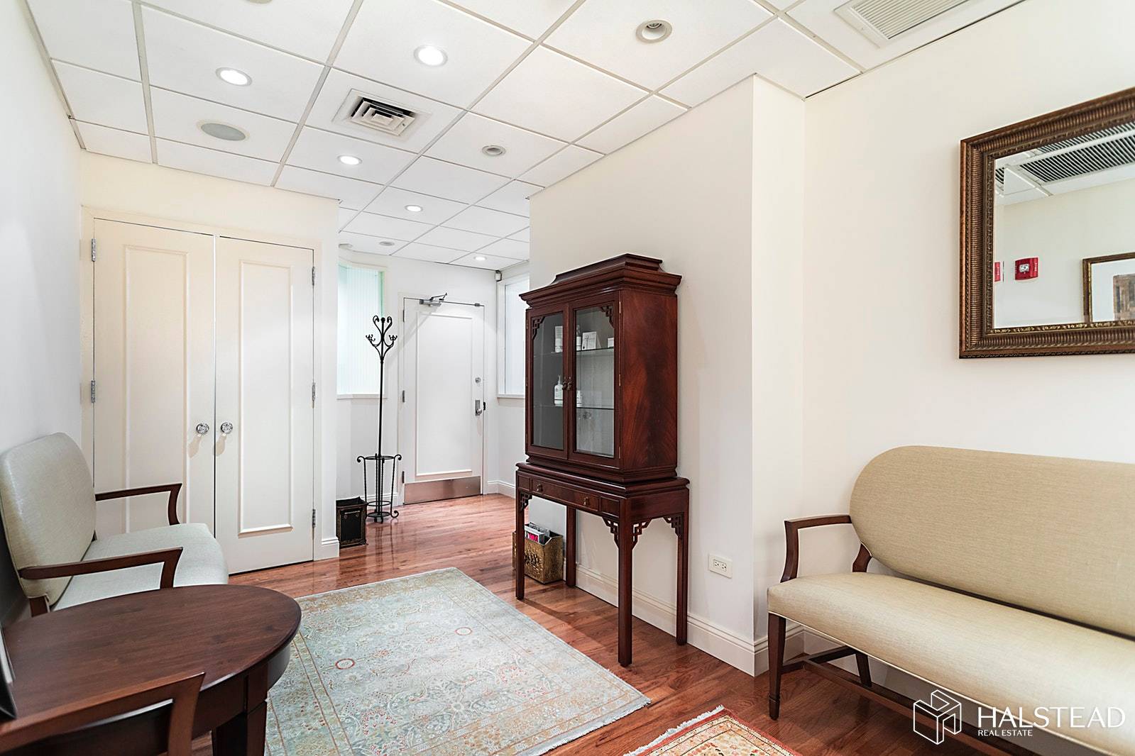 This Madison Ave Medical CONDO shows like a model.