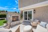 View of patio featuring an outdoor living space with a fireplace