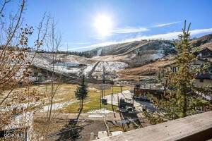 This ski in ski out condo sits at the base of Granby Ranch and has the perfect ski area view sitting above the base area.