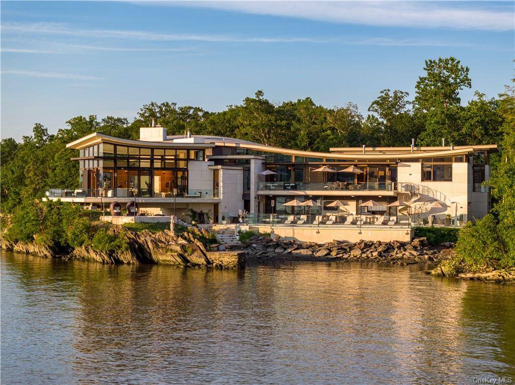 A modern day tour de force, this epic Hudson River showplace shares its remarkable waterfront setting with a guest house, sculpture garden, collector's garage, and 5 star amenities that transcend ...