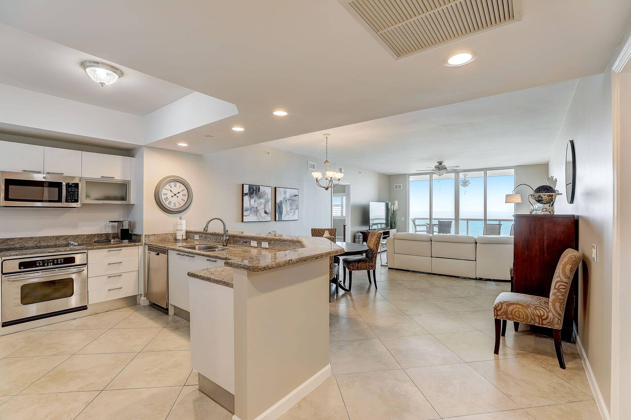 Resort lifestyle and newly renovated amenities of Marina Grande while overlooking long intracoastal views of Singer Island from this 3 br.